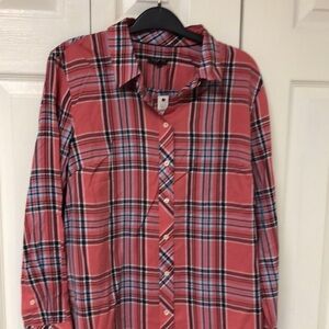 Classic checkered shirt. Pinkish rise color, less red than photos.
